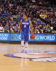 Hofstra Senior, Dion Nesmith, brings the ball up court in 2014 CAA Quarterfinals against Delaware. Photo Credit-Jeff Lansky