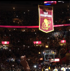The Cavs championship banner heads to the rafters of Quicken Loans Arena on October 25. Photo Credit-Jeff Lansky